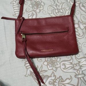 Maroon Vince camuto purse.